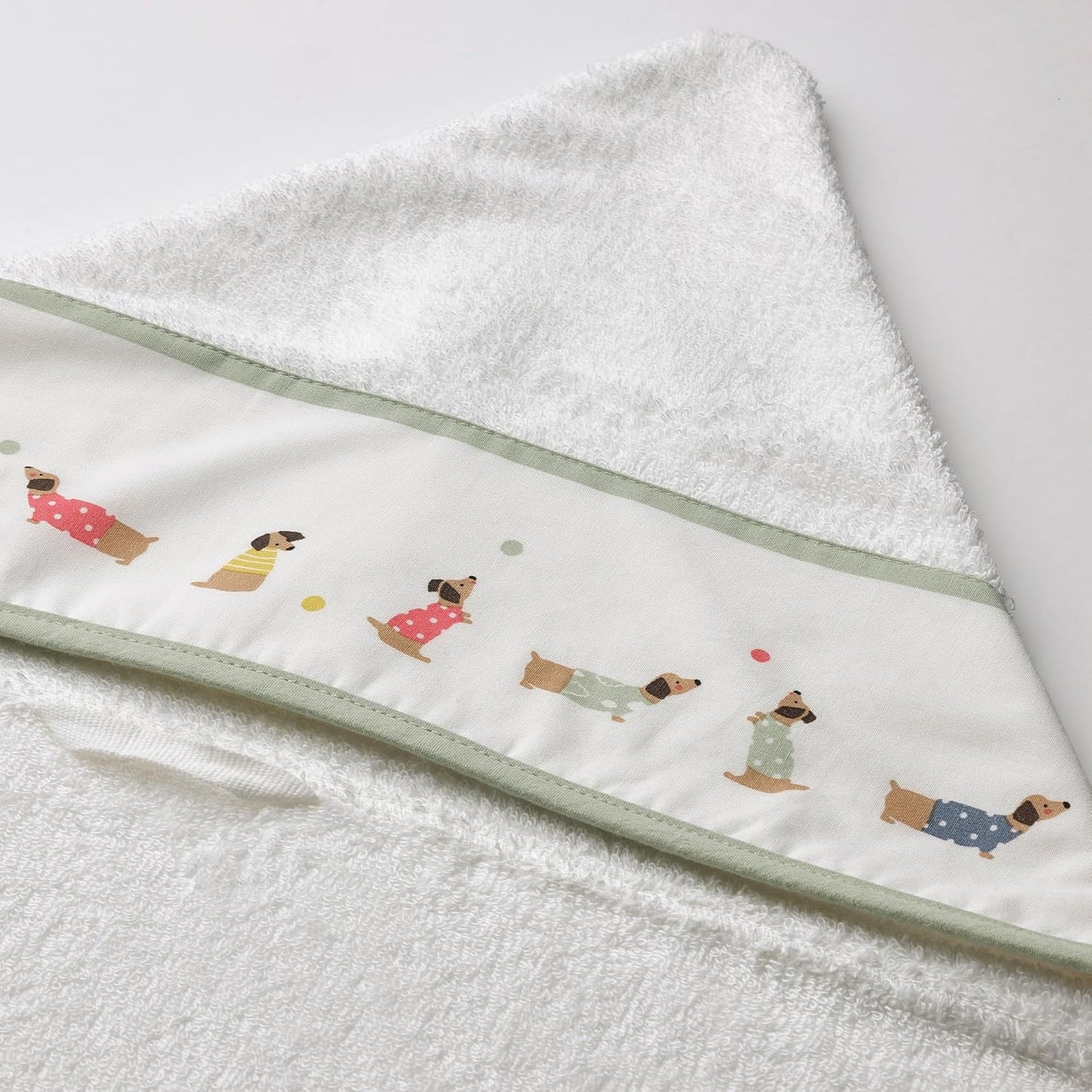 DRÖMSLOTT baby towel with hood, 60x125 cm, puppy pattern/white