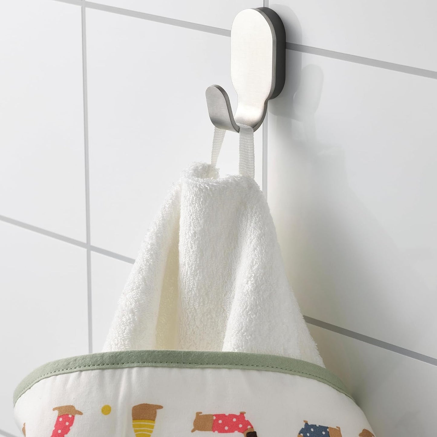 DRÖMSLOTT baby towel with hood, 60x125 cm, puppy pattern/white