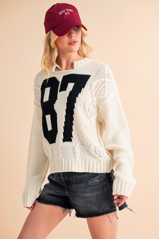 Aemi+Co Contrast Number Cable Knit Drop Shoulder Sweater